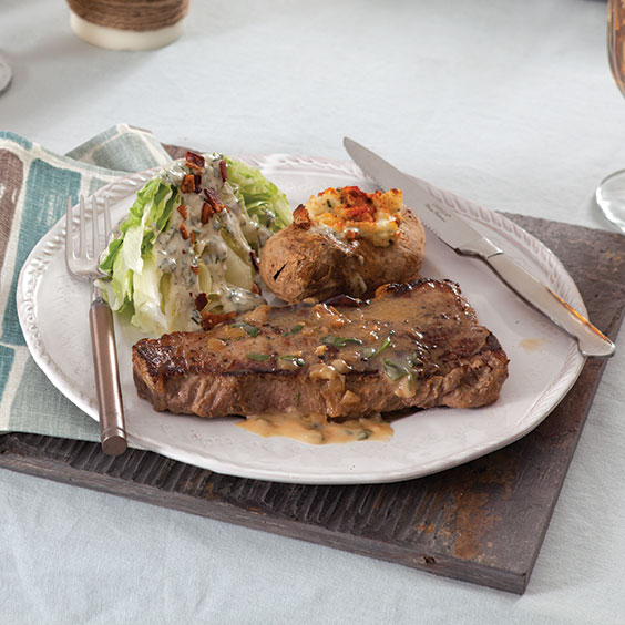 Strip Steaks with Balsamic Butter Sauce