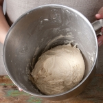 bread dough in a mixing bowl