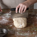 dividing bread dough for rolls